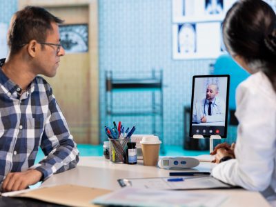 Behavioral health therapist using Medi-EHR software to manage patient records