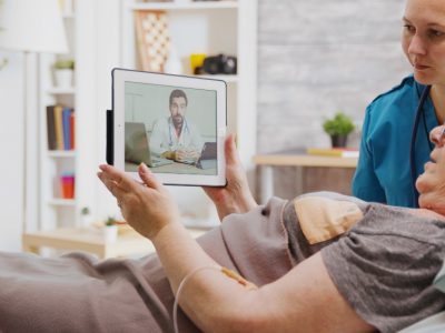 Mental health therapist using Medi-EHR software to manage patient sessions efficiently